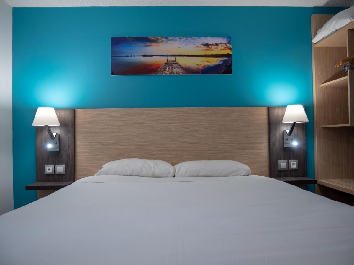 Contact Hotel Restaurant Bleu France - Eragny Cergy Zewnętrze zdjęcie